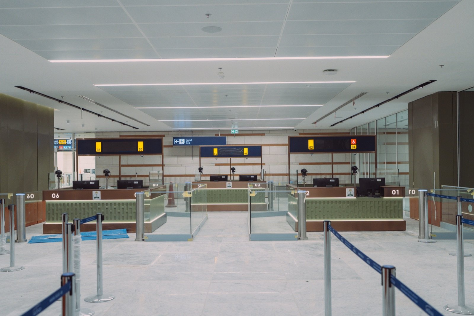 Passport control counters with queue barriers in the renovated terminal