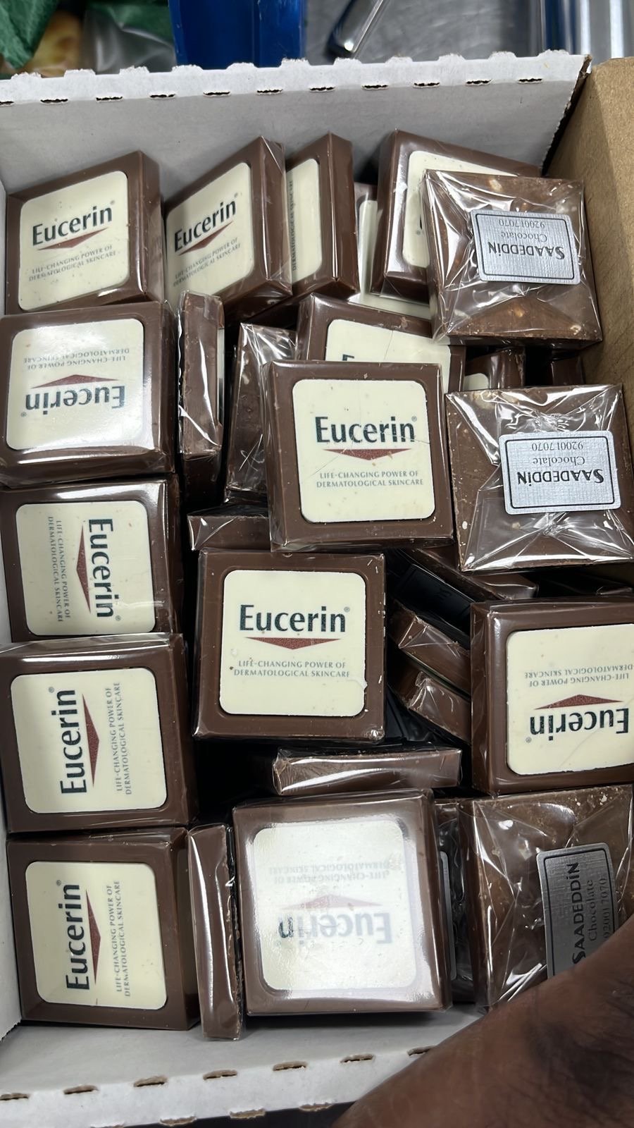 Individually wrapped Eucerin-branded chocolates
