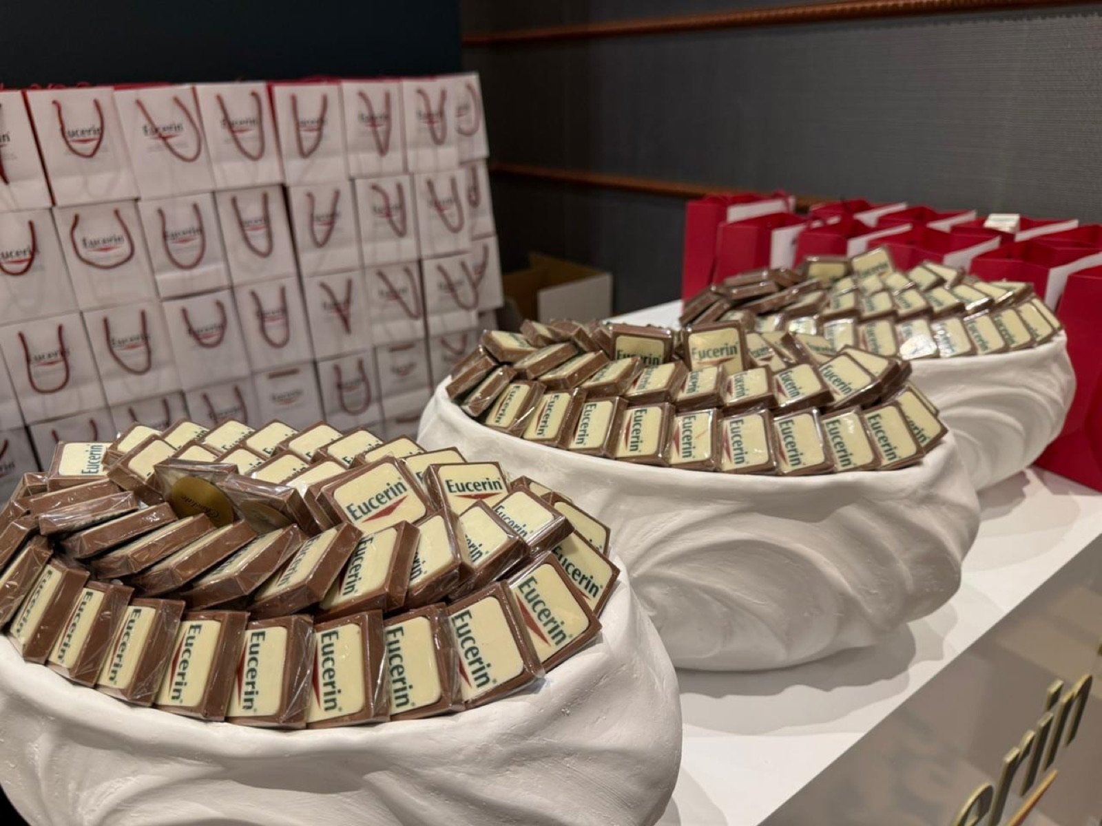 Eucerin gift bags and chocolate displays prepared for guests