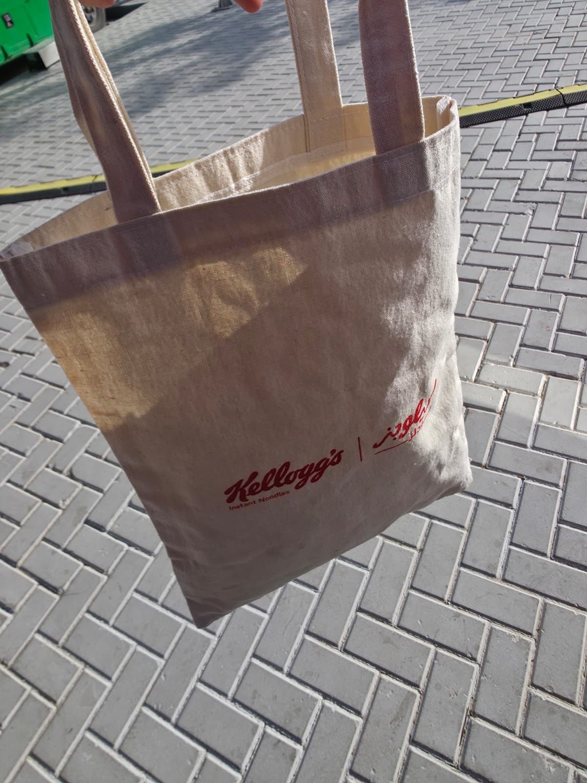 Canvas tote bag with bilingual Kellogg's Instant Noodles branding