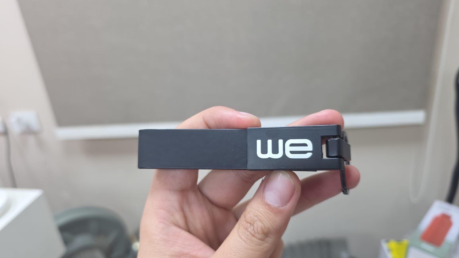 WE branded keychain